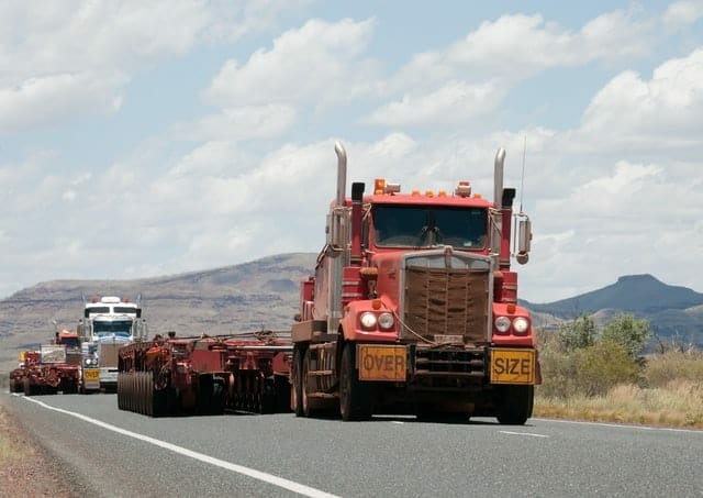 Large trucks driving without cargo.